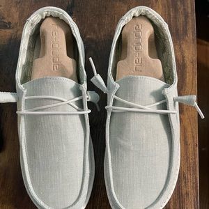 HeyDude women’s size 9. Brand new, never worn. Light green with sparkles.